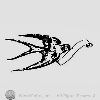 A swallow with a ribbon in its beak