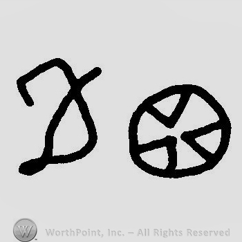 A circle with three triangles inside and an uppercase handwritten D