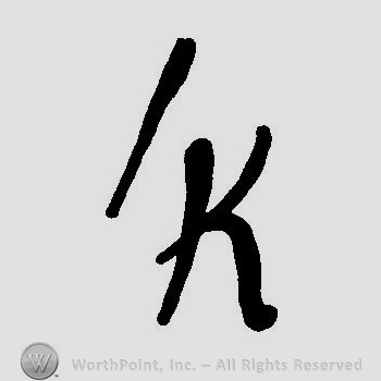 Slash over capital K.