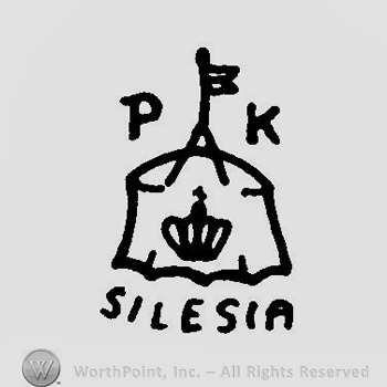 A crown inside the drawing of a tent and the text P K Silesia