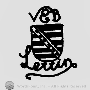 A shield wiith horizontal stripes and an oblique line and the text VEB Lettin