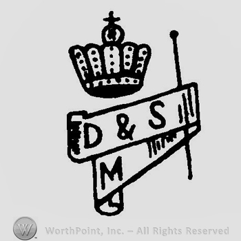 A crown above a ribbon with a needle through it and the text D & S M