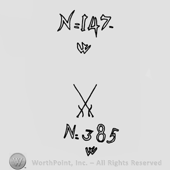 Two swords crossed above the text N = 385 W incised