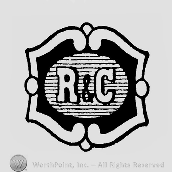 The initials R & C inside an oval that is inside a frame