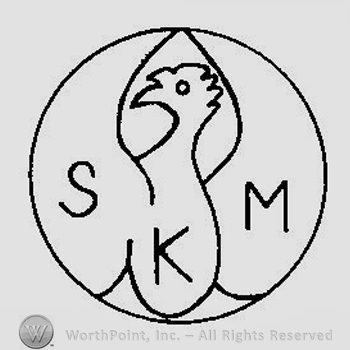The outline of a phoenix bird inside a circle and the initials S K M
