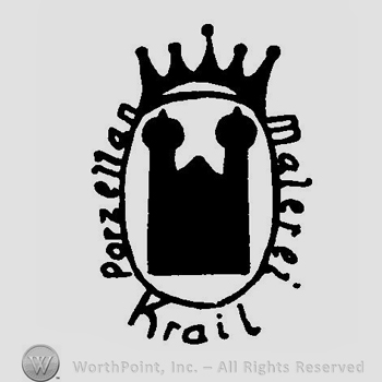 A crown above an oval with a castle shape inside and the text Krail Malerei Porzellan