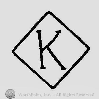 Uppercase letter K inside a diamond.