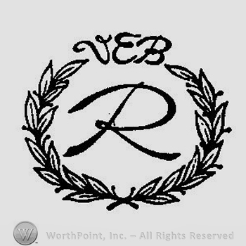 Two branches with leaves with the initials VEB R in between