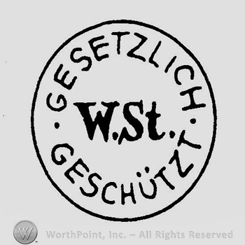 A circle with the text W St Gesetzlich Geschutzt inside