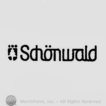 A shield with a fir tree and the word Schonwald