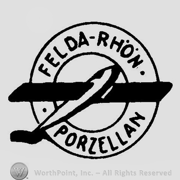 An airplane inside a double circle and the text Felda Rhon Porzellan