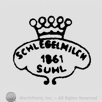 A crown above a simple cartouche with Schlegelmilch 1861 Suhl