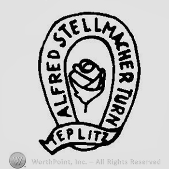 A ribbon in the shape of a horse shoe that says Alfred Stellmacher Turn Teplitz with a rose inside