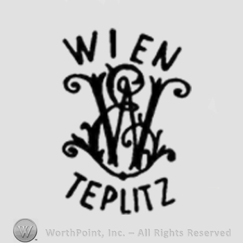 The intials E W overlapping and surrounded by the text Wien Teplitz