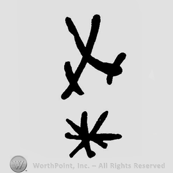 Two crossed swords with a star in between in the lower part