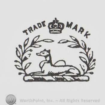 two branches around a crown above a hound dog and TRADE MARK