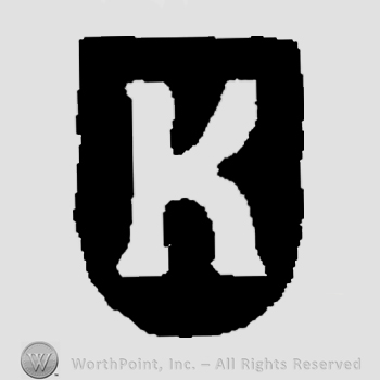 Letter K on a black background.