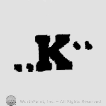 Letter K between quotation marks.