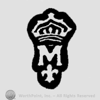 Crowned M with a fleur-de-lis bellow.