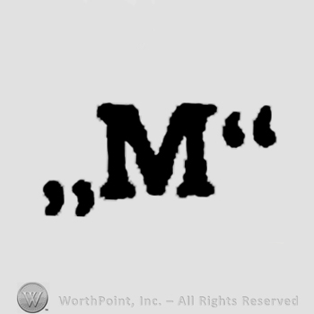 Letter M between quotation marks.