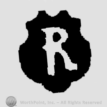 Letter R over a black shield.