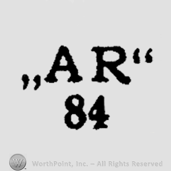 The initials A R above the number 84