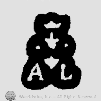 A crown above a fleur de lis and the initials A L