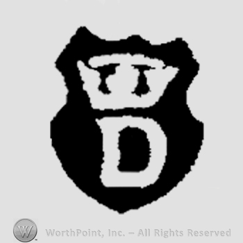 A shield with a crown above an uppercase D