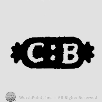 The initials C B inside an oval with half stas on the sides