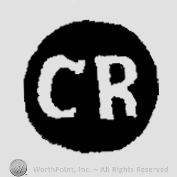 The initials C R inside a circle