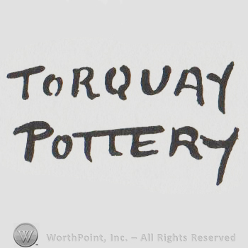 the words TORQUAY POTTERY in uppercase letters