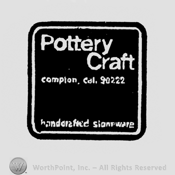 stylish writing POTTERY CRAFT COMPTON CAL 90222 HANDCRAFTED STONEWARE in white inside a black square