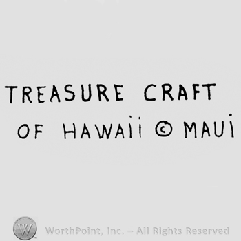 capital letters TREASURE CRAFT up OF HAWAII  C inside a circle MAUI down