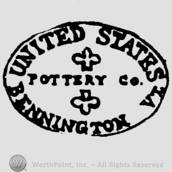 curved capital letters UNITED STATES up BENNINGTON VT down POTTERY CO middle between two clovers all inside an oval