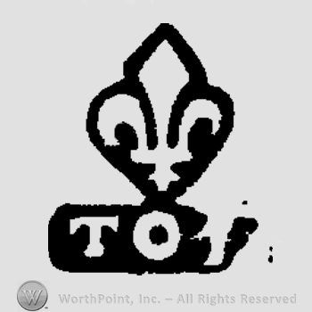 TOT written;fleur-de-lis on top.