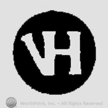Monogram of letters VH inside of a circle.