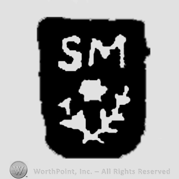 Shield shape with letters S M inside;branches.