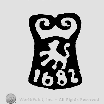 An animal with a crown on top;1682 written below.