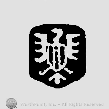 A bird,eagle,inside a shield shape.
