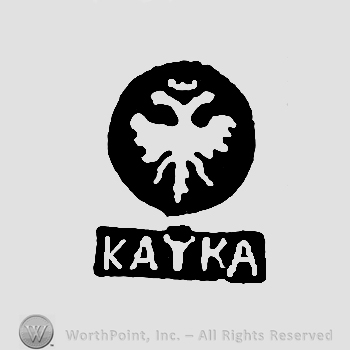 An insect inside a circle with a crown on top;word KAYKA written inside a rectangle below.