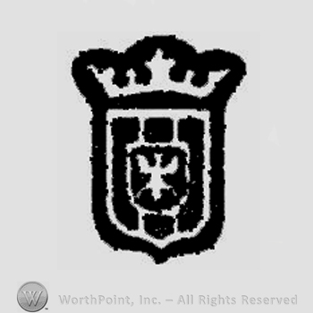 A shield with an eagle inside and a crown on top.