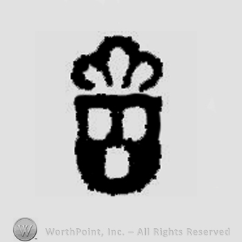 Shape similar to a mask with a crown.