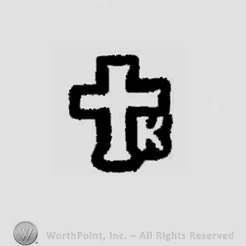 A cross and letter K.