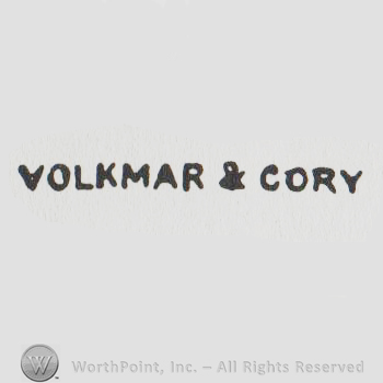 the text VOLKMAR & CORY  in uppercase letters