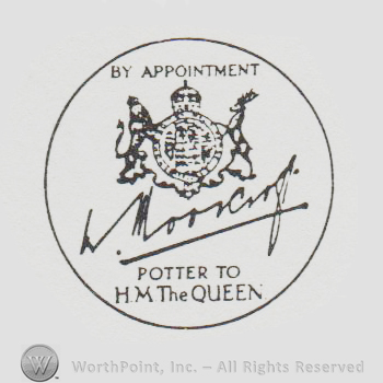 an oval with a crown a lion and a deer above the signature W MOORCROFT and the text BY APPOINTMENT POTTER TO H M THE QUEEN inside a circle 
