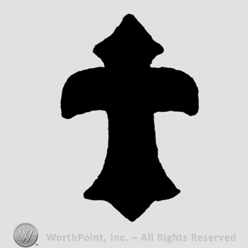 A cross that resimbles a fleur de lis