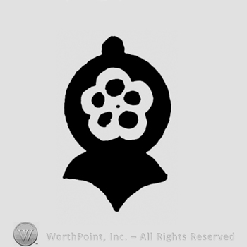 A flower inside a circle with a triangular shape on the bottom