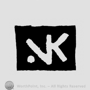 A rectangle with the initials N K inside