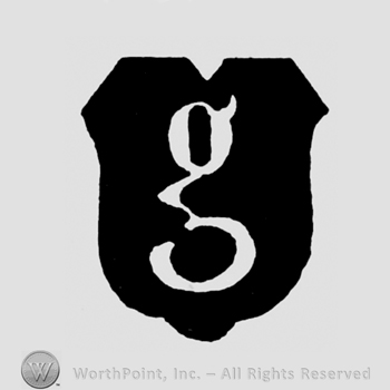 A lowercase G on a shield