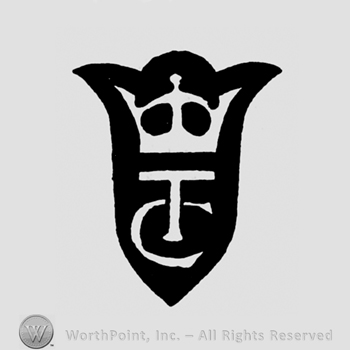 A shield with a crown and the initials C T overlapping
